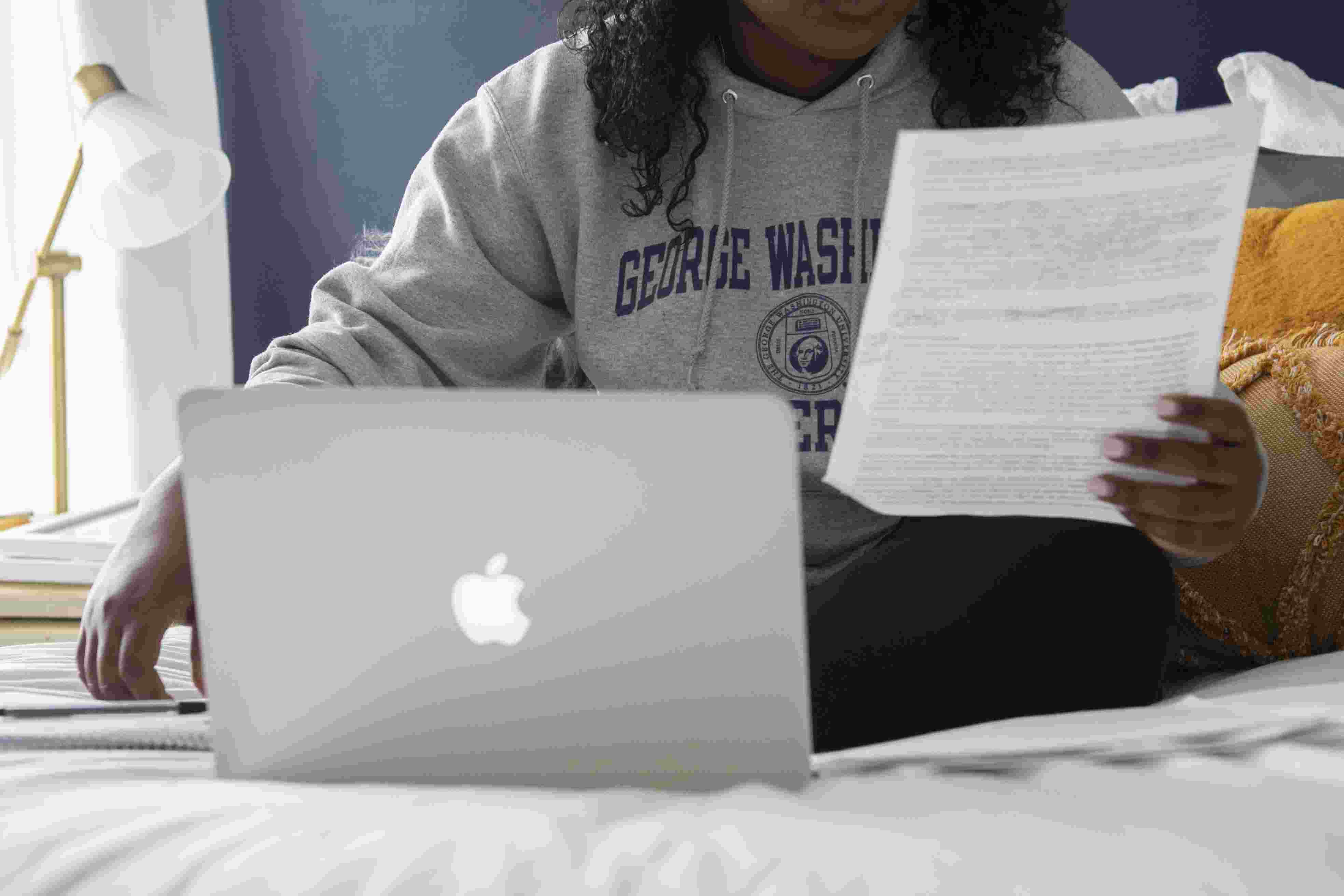 A student works on their laptop