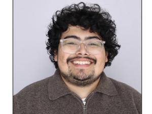 Headshot of J'Reisz Garcia