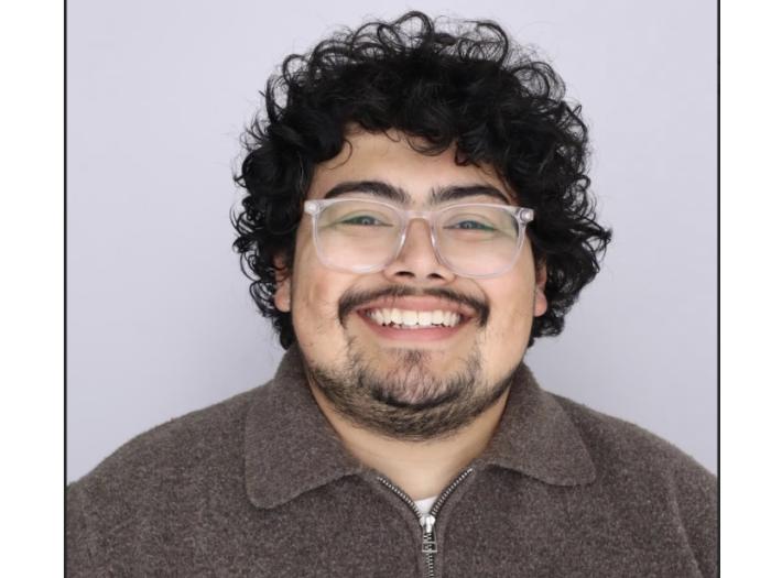 Headshot of J'Reisz Garcia